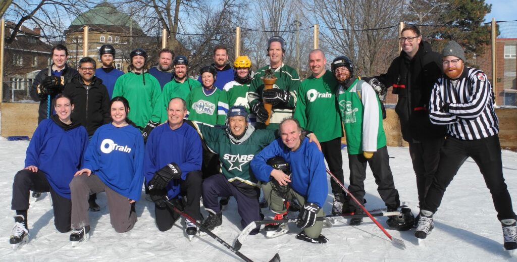 Group photo of players from finalist teams, OOE Hosers and OOS Moose, Councillor Menard and Miles Krauter who officiated all games from Capital Ward Office, and Yasr Naqvi, MP